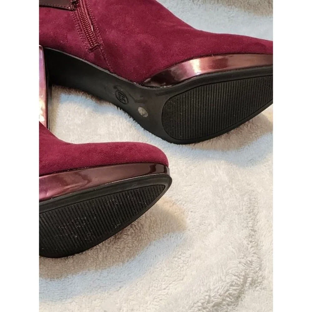 Women’s East 5th faux suede ankle booties in a rich maroon color with glossy pat